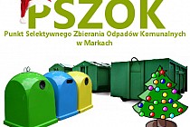 Zdjęcie przedstawia kontenery na odpady oraz świąteczną choinkę